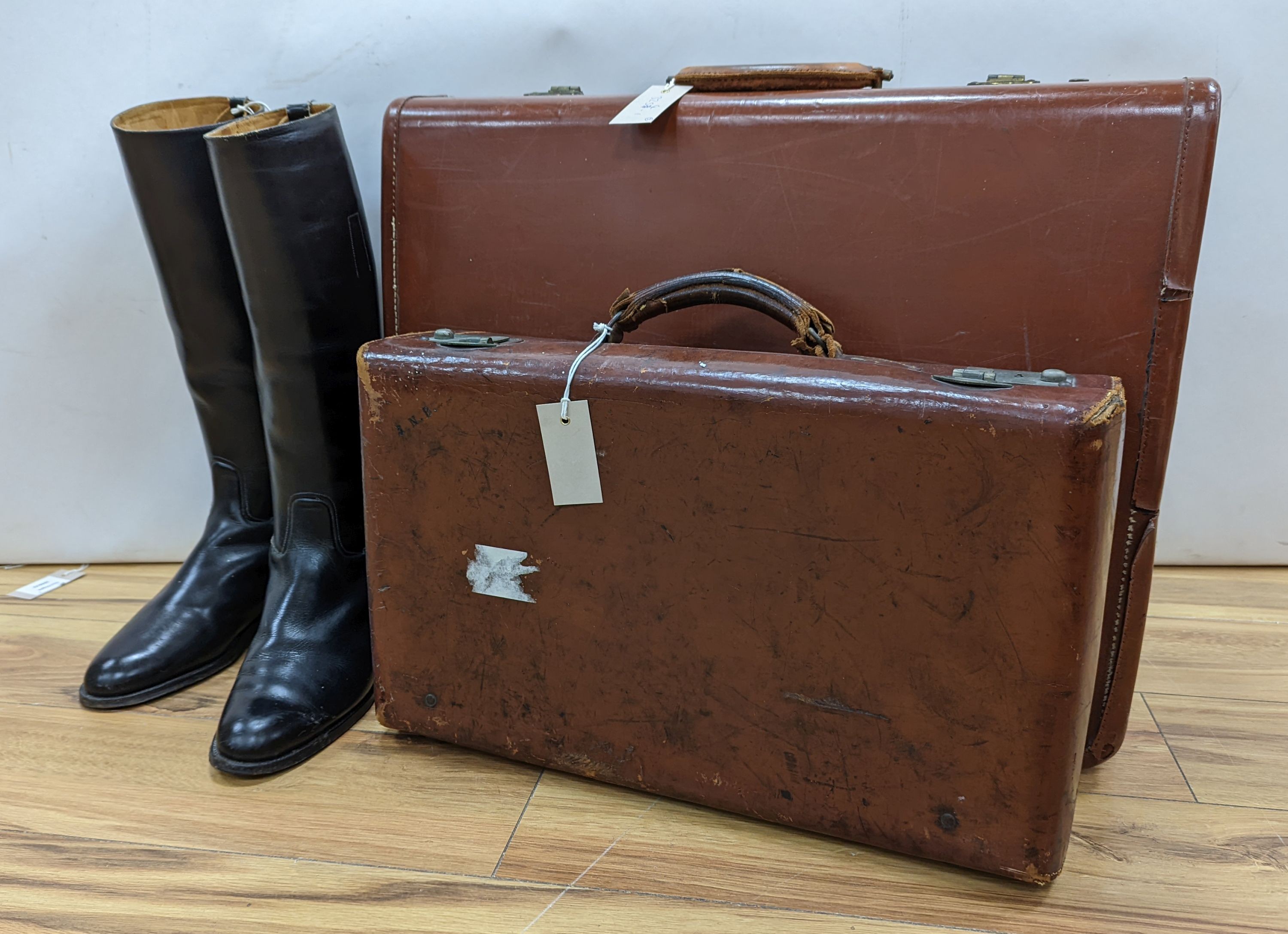 A pair of gents riding boots and 2 vintage cases, largest case, 48 cms high x 62 cms wide